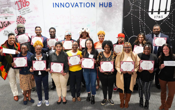 The graduates of Innovation Bootcamp cohort 7 “Entrepreneurs of Color” show off their certificates.