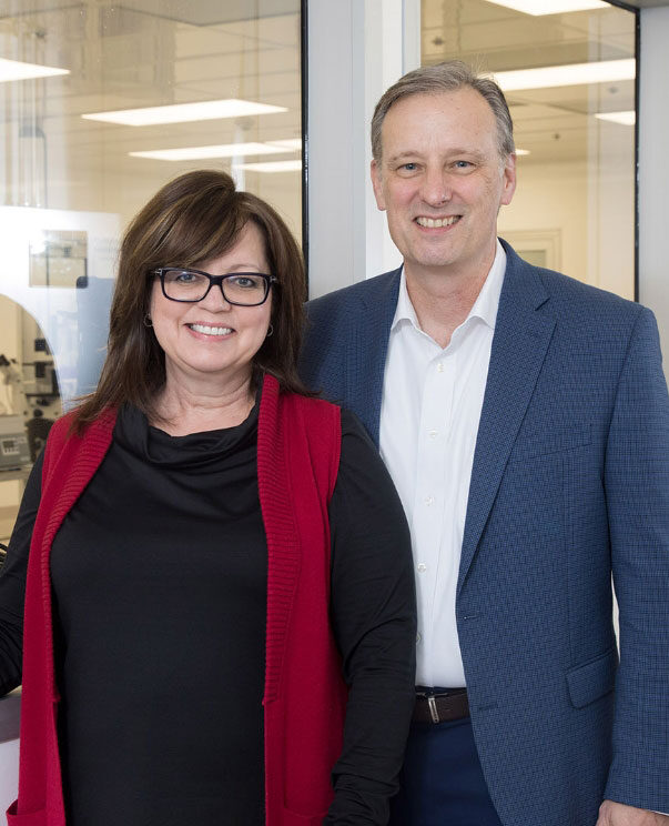 Tracey Worthington-Stice and Steve Stice stand together for a portrait