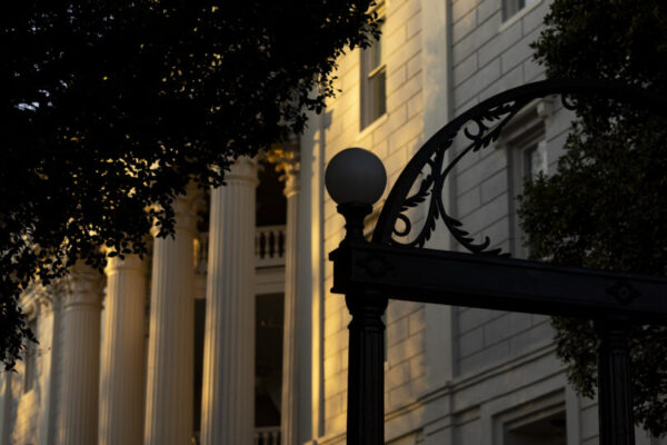 $8.4 Billion Economic Impact on Georgia. Corner of arch in sunset.